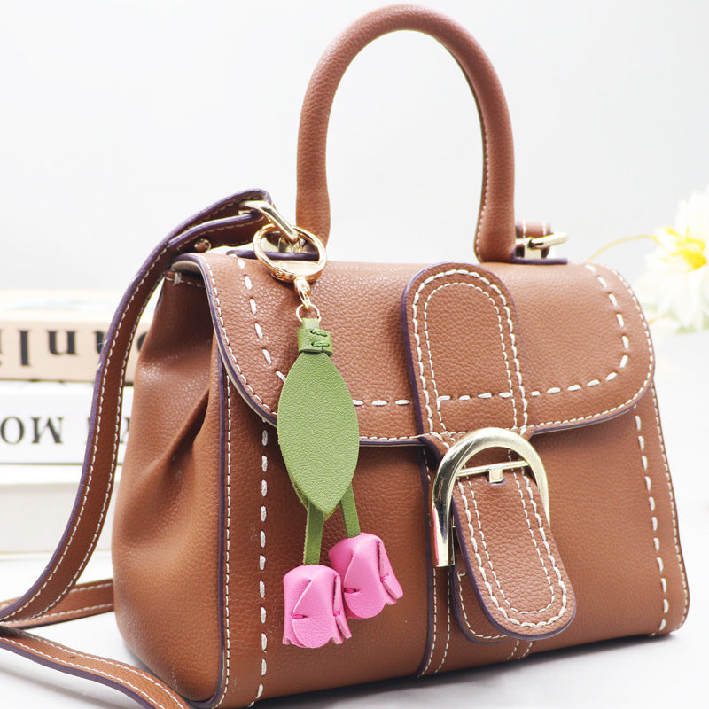 Little red book with tulip keychain cute personality car key bag pendant can be printed logo factory direct sales