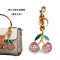 Factory direct Amazon jewelry package pendant cherry key buckle air car cherries crystal powder resin key chain