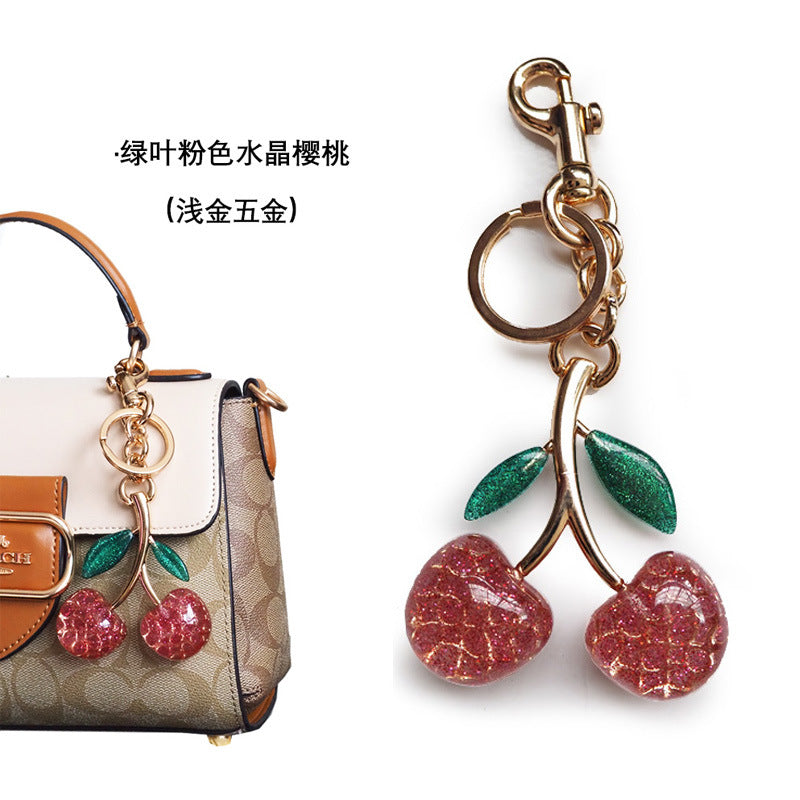 Factory direct Amazon jewelry package pendant cherry key buckle air car cherries crystal powder resin key chain