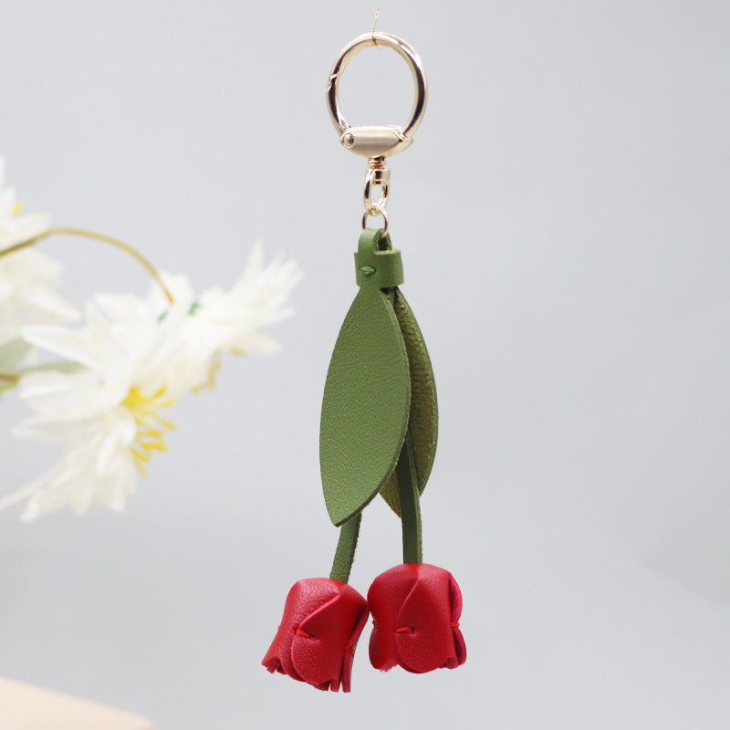 Little red book with tulip keychain cute personality car key bag pendant can be printed logo factory direct sales