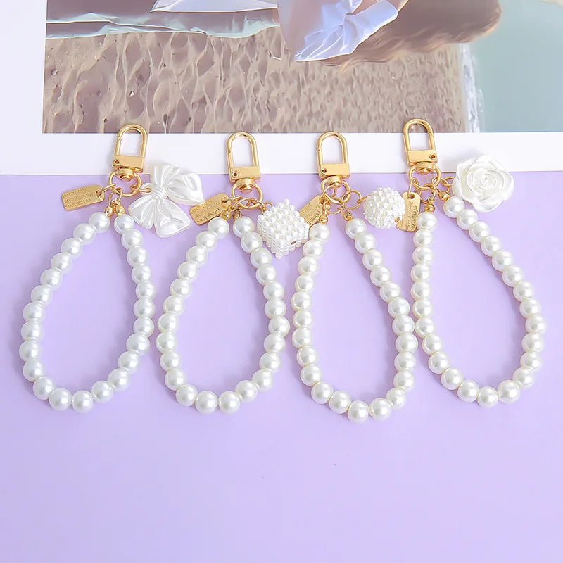 Lovely Beaded Bowknot Keychains Elegant Pearl Chain Pendant Women Bag Charms Hanging Ornament DIY Headphone Case Accessories