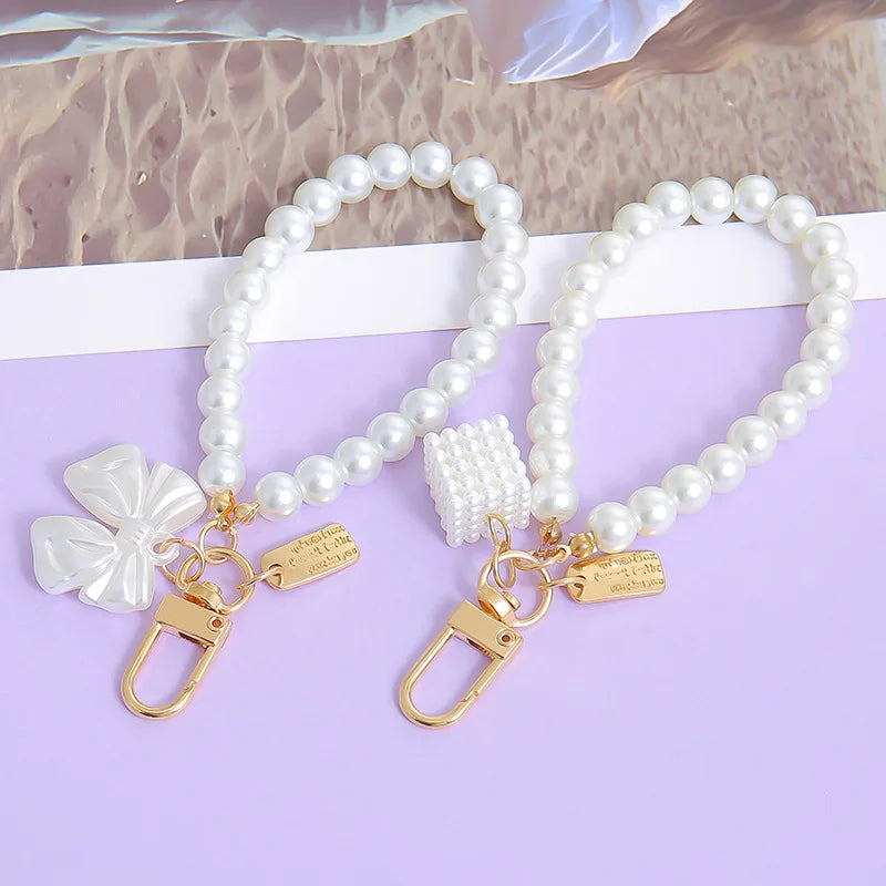 Lovely Beaded Bowknot Keychains Elegant Pearl Chain Pendant Women Bag Charms Hanging Ornament DIY Headphone Case Accessories