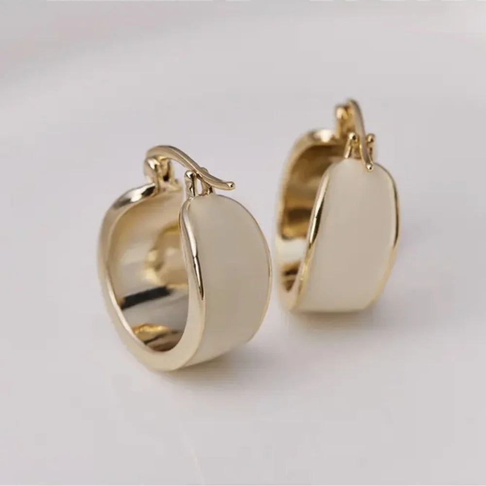 Simple and fashionable jewelry 18K gold-plated metal drop glaze exaggerated earrings modern women's daily accessories jewelry