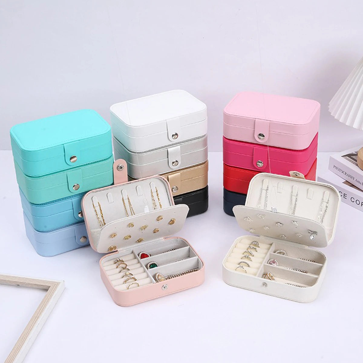 Portable multi-compartment jewelry box with velvet lining - travel-friendly pink accessory storage box